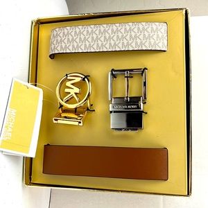 Michael Kors belt set comes with gold and silver hardware.